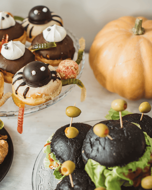 Halloween food ideas with spooky Spanish cheese, olives, cured meats and sweets