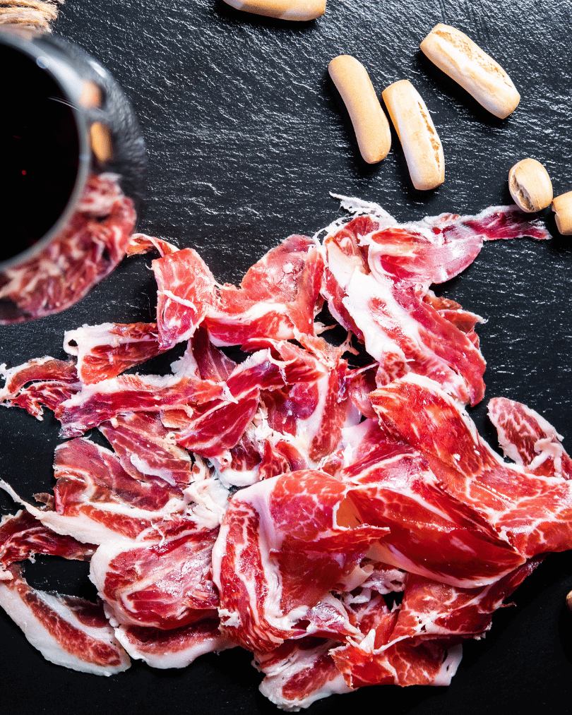 Jamón Ibérico Spanish cured ham thinly sliced and ready to serve
